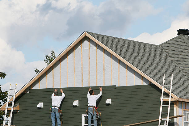 Professional Siding technician working in Carrsville, VA